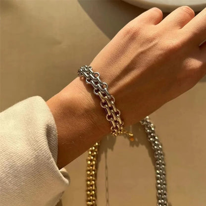 Chunky Two Tone Textured Circle Clasp Bracelet