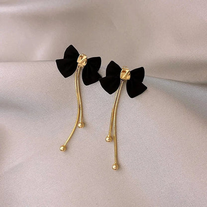 Dainty Bow Gold Dangle Earrings