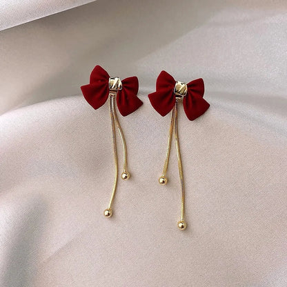 Dainty Bow Gold Dangle Earrings