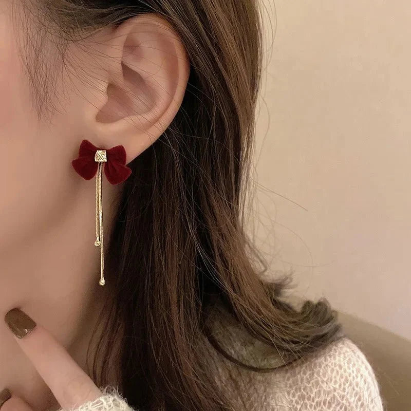 Dainty Bow Gold Dangle Earrings