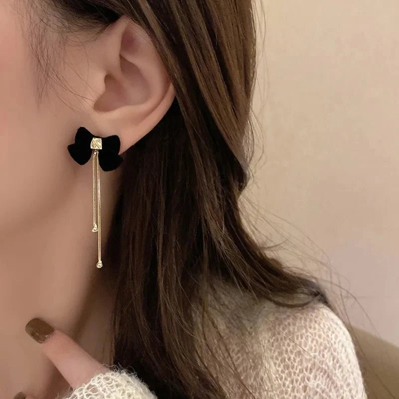 Dainty Bow Gold Dangle Earrings