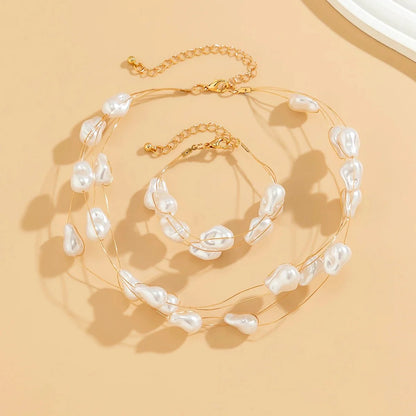 Layered Strung Pearls Bracelet and Necklace